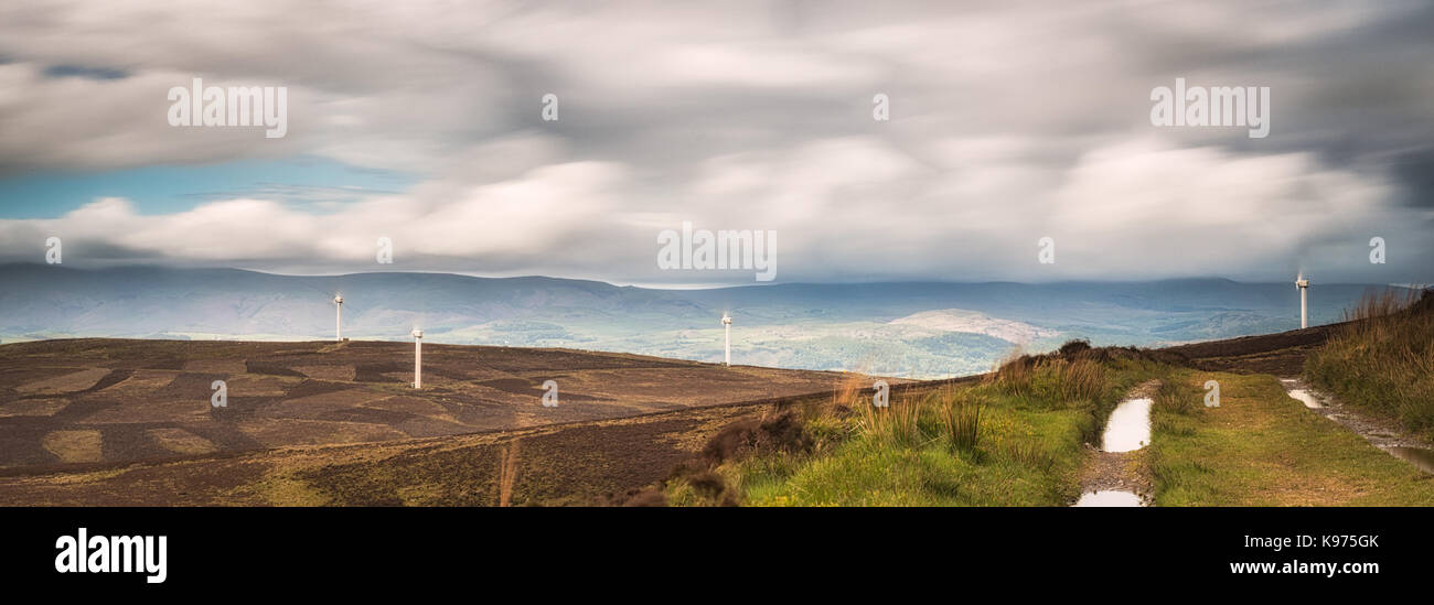 Taken on Lowick High Common looking out towards the Duddon Valley beyond the windfarms.  It was cold and windy up there this afternoon! Stock Photo