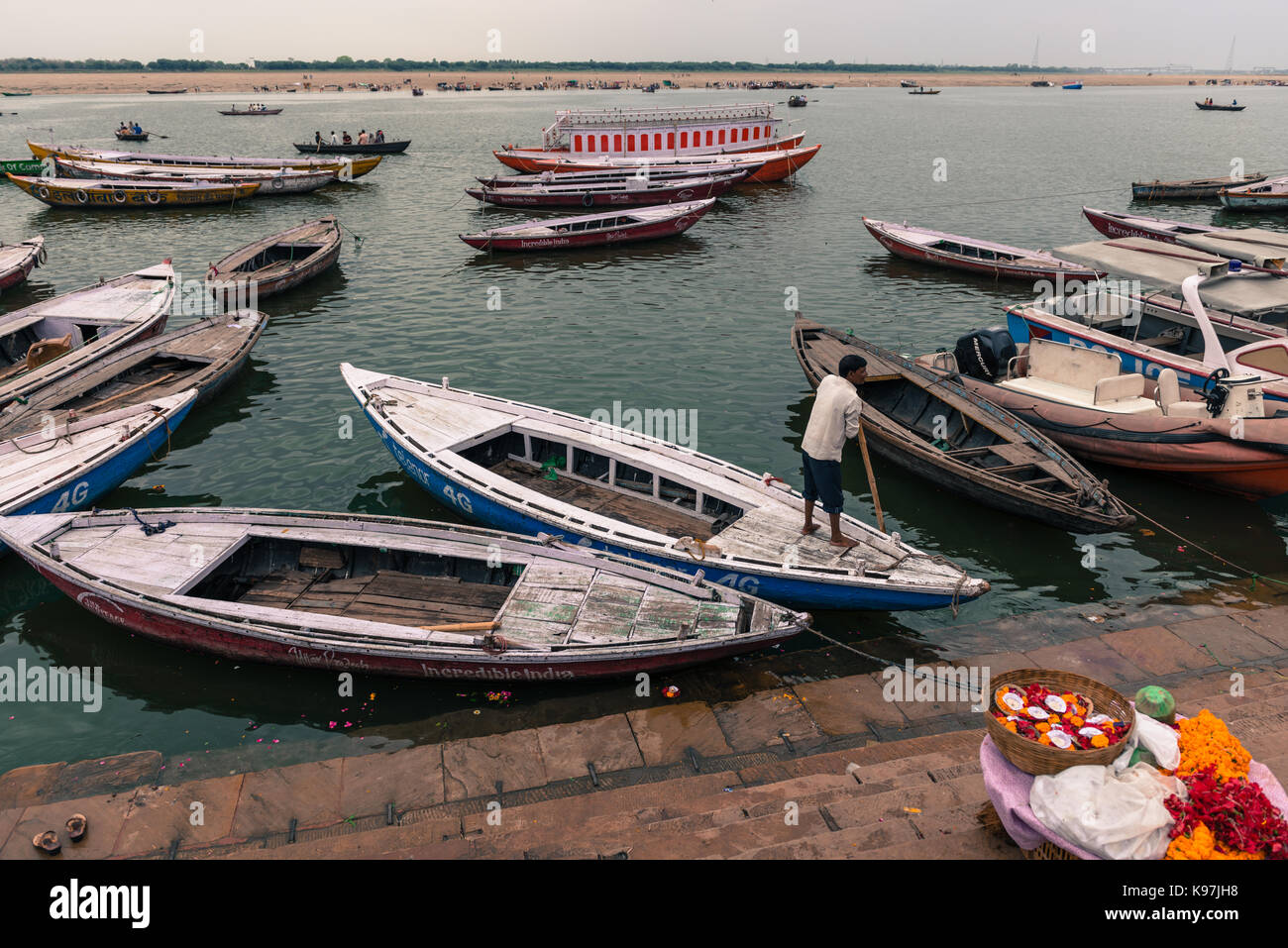 VARANASI, INDIA - MARCH 13, 2016: Horizontal picture of many docked ...