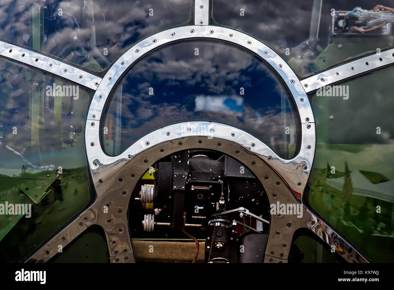 The sky reflecting off the front of a World War Two bomber’s cockpit. Stock Photo