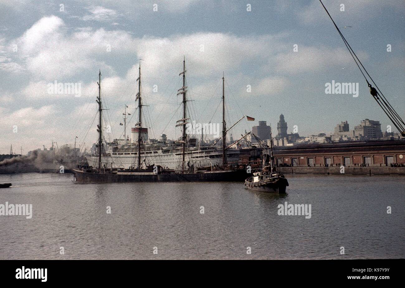 Pamir with liner Giulio Cesare (or Augustus) in the background in the port of Montevideo (1950s) Stock Photo