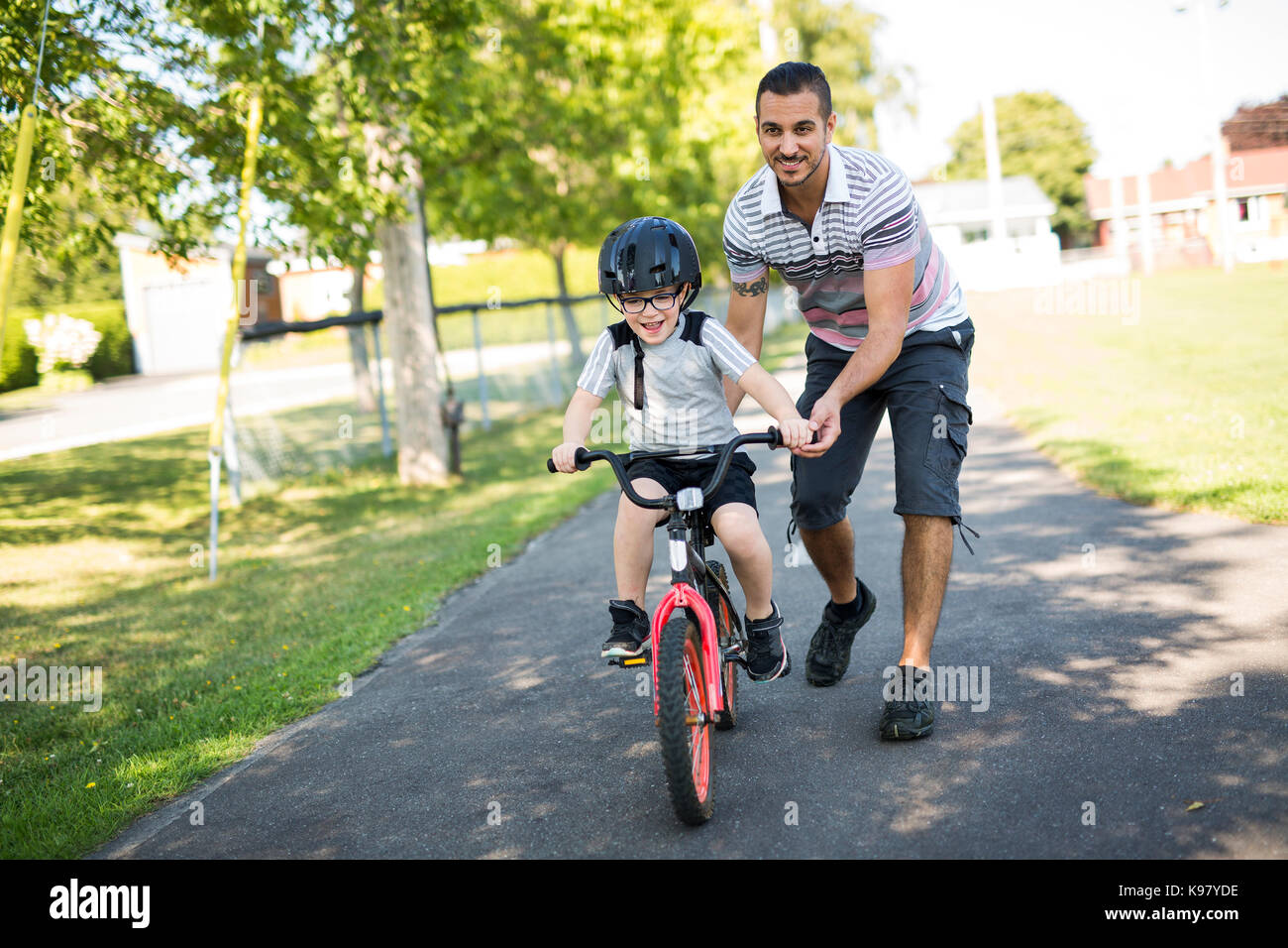 how to teach son to ride a bike