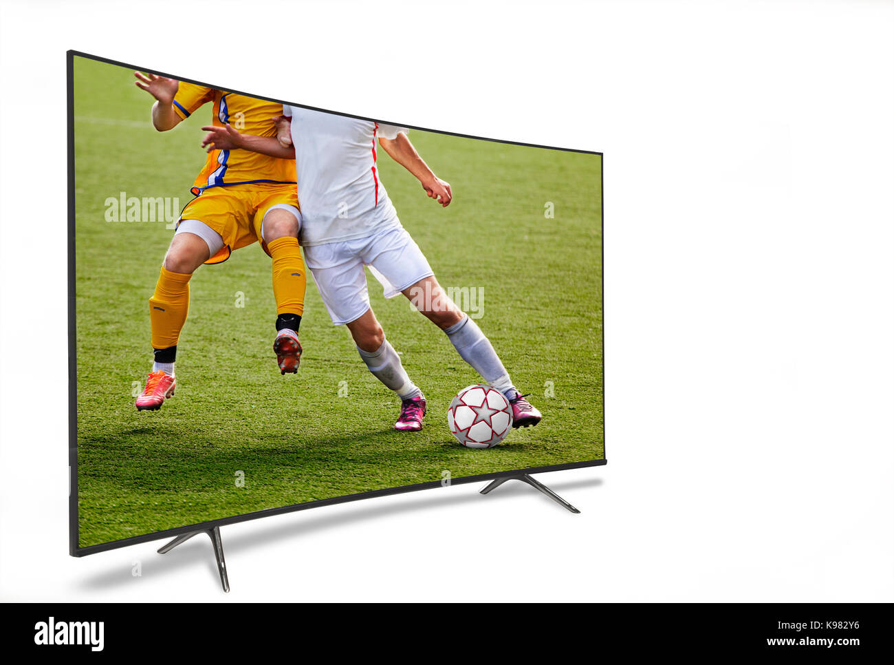 watching smart tv translation of football game. Stock Photo