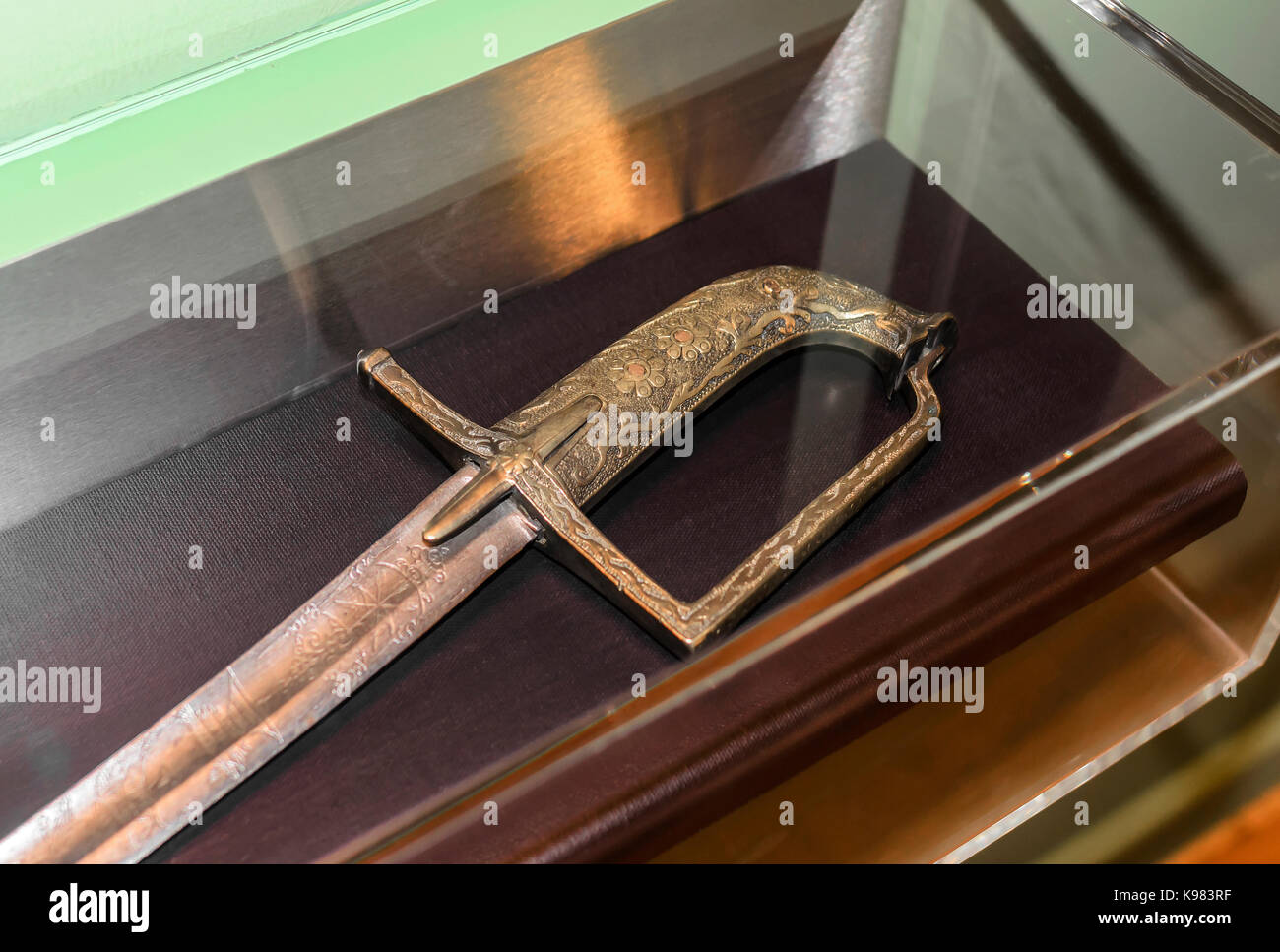 Handle of the old saber. Stock Photo
