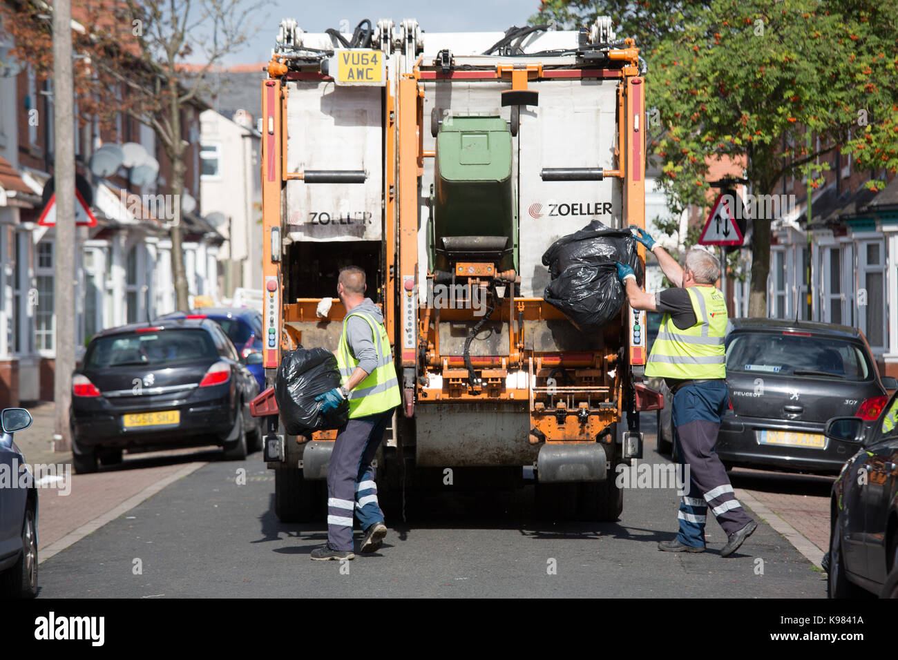 Piles of rubbish in Medley Road, Tyseley, Birmingham during the bin men's strike. Stock Photo