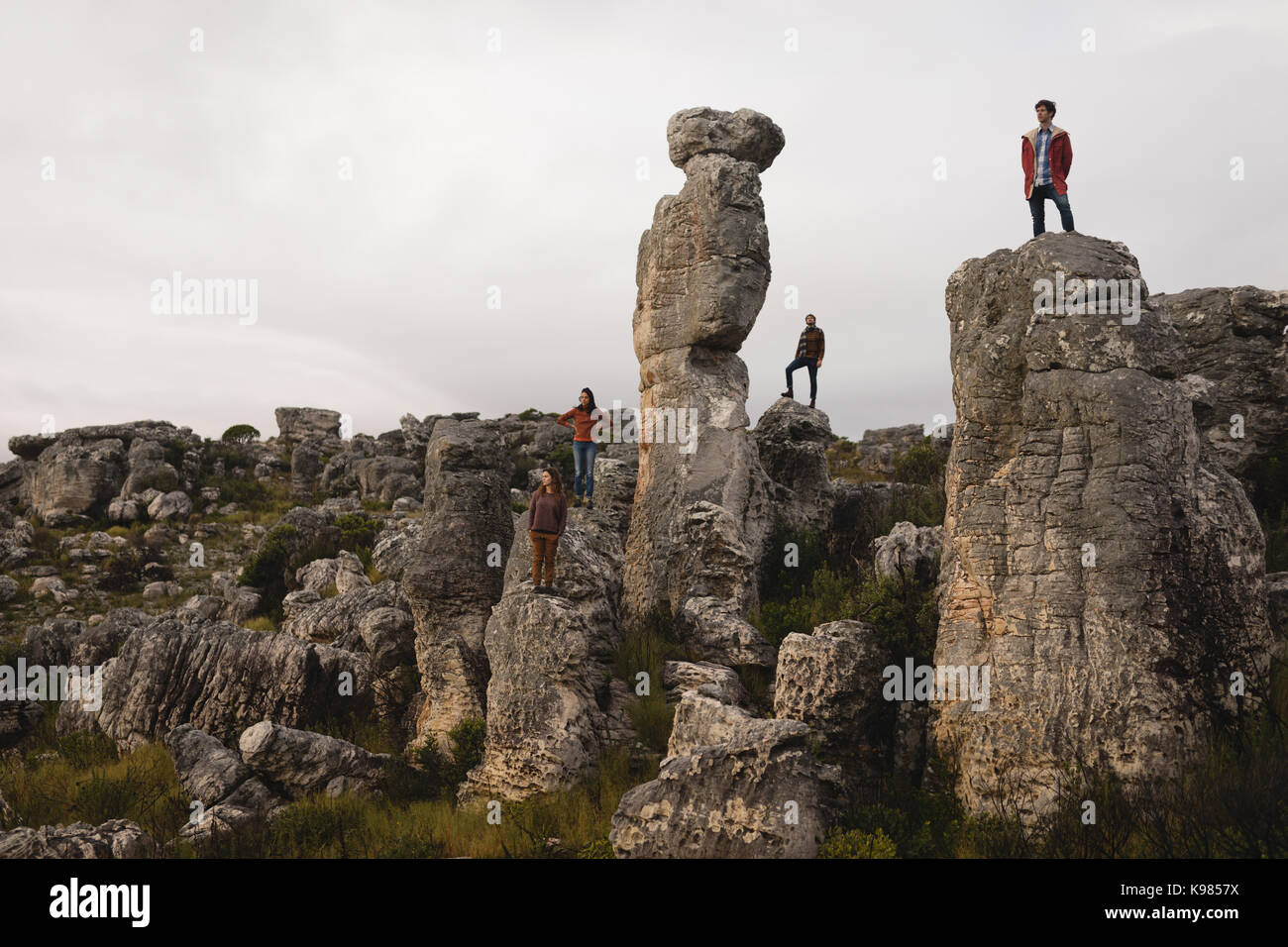Female standing cliff top hi-res stock photography and images - Alamy