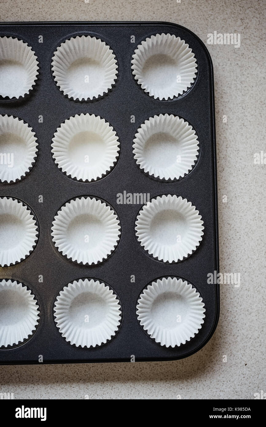 Overhead of cup case in baking tray Stock Photo