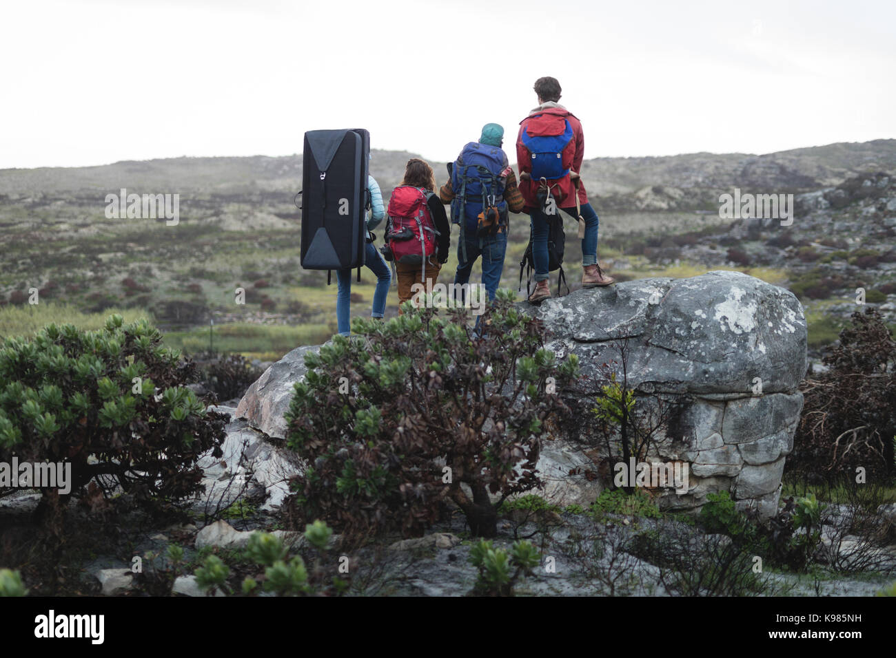 Female standing cliff top hi-res stock photography and images - Alamy
