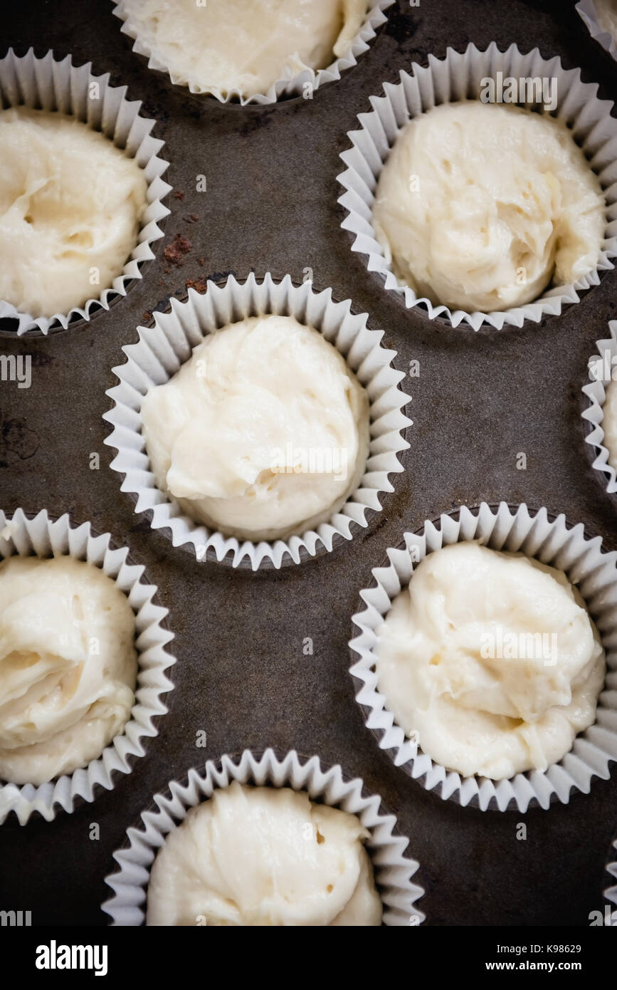 Closeup of cup cakes in oven tray Stock Photo Alamy
