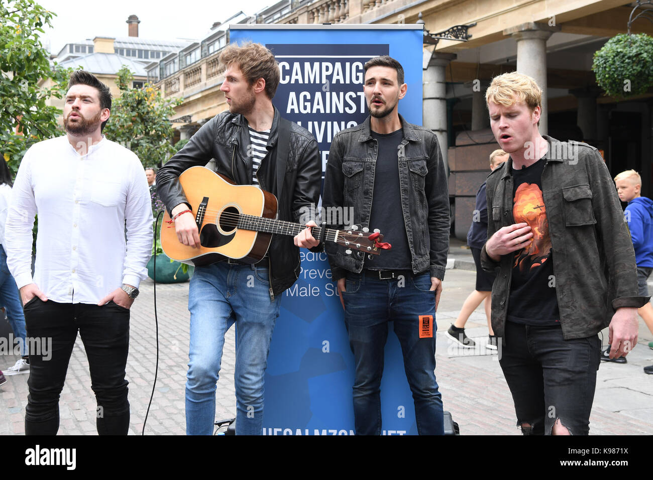 Irish rock band Kodaline busking at Tottenham Court Road Station and in Covent Garden in Central London to raise awareness for male suicide prevention charity CALM (Campaign Against Living Miserably).  Featuring: Kodaline, Steve Garrigan, Vinny May, Jr., Jason Boland, Mark Prendergast Where: London, United Kingdom When: 22 Aug 2017 Credit: Carsten Windhorst/WENN.com Stock Photo