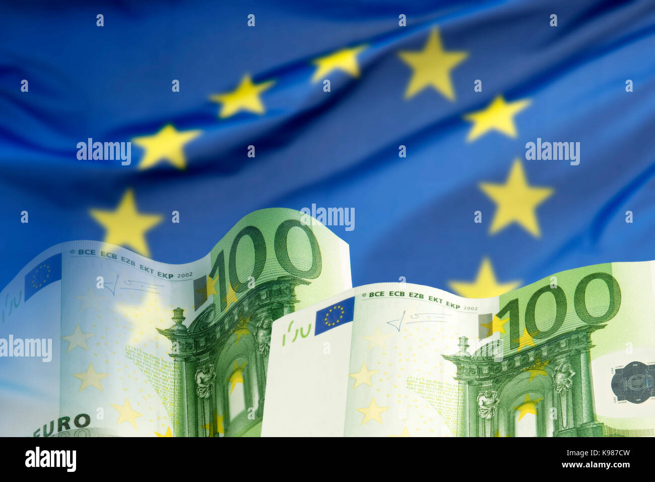 Two hundred Euro banknotes before the European flag Stock Photo