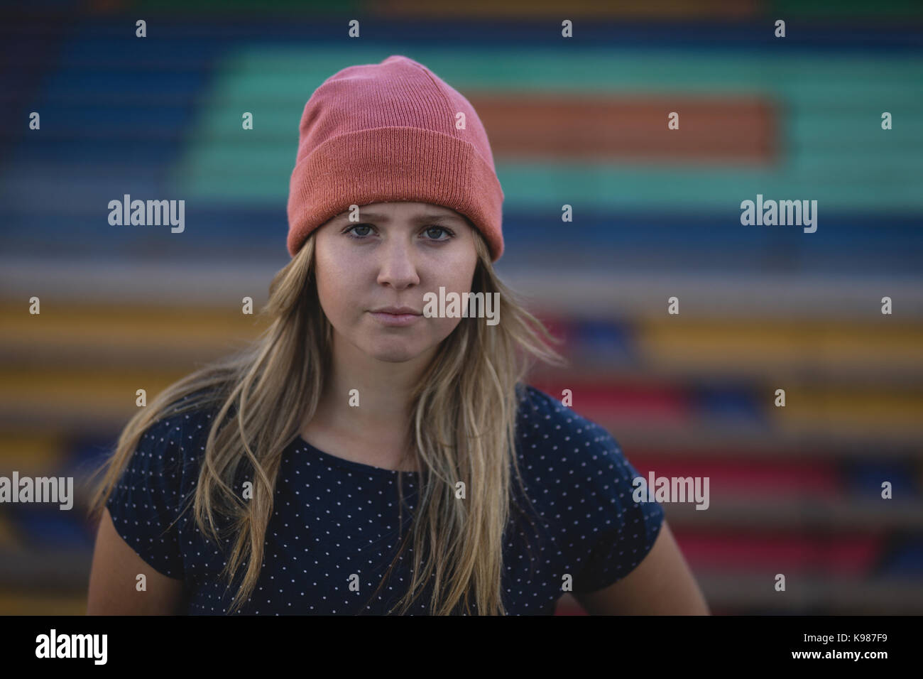 Portrait of young woman wearing knit hat Stock Photo