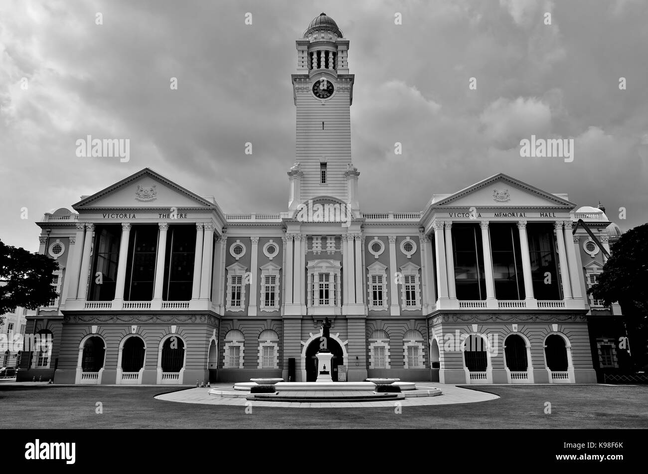 Clock tower and facade of the Victoria Memorial Hall, Singapore Stock Photo