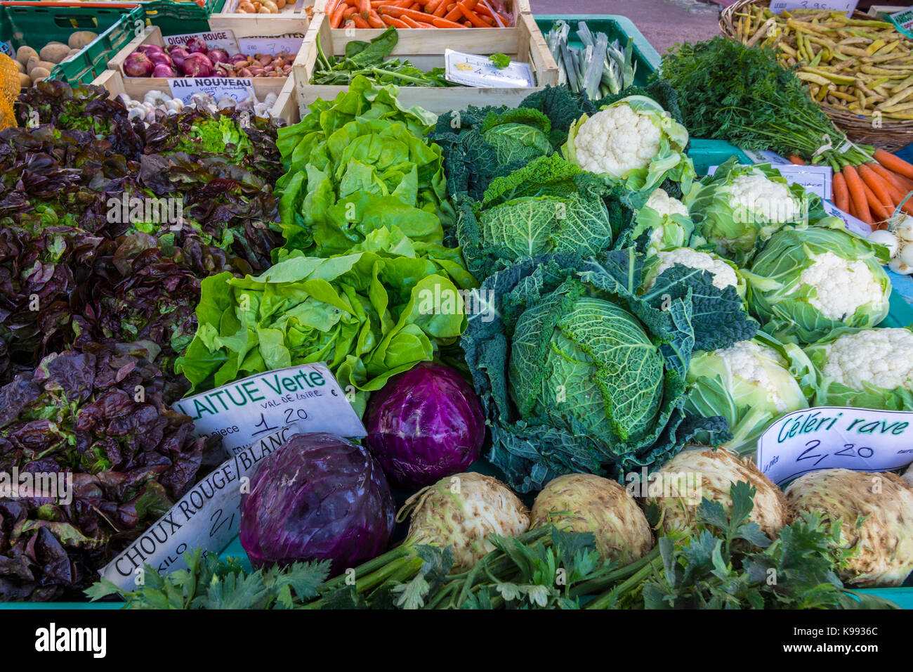 Fresh vegetables on market stall, France. Stock Photo