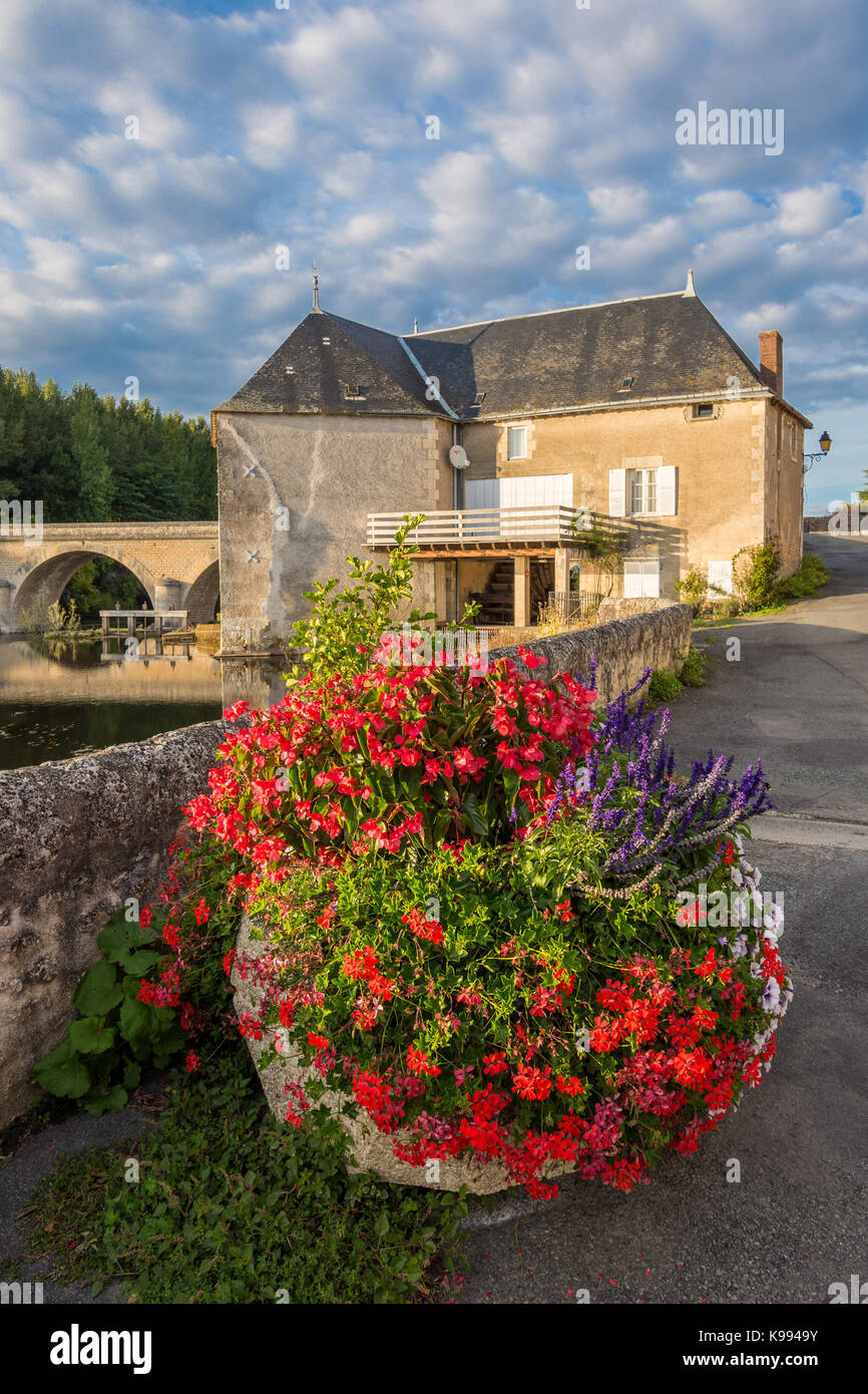 Mill and bridge over river Gartempe, Saint Pierre de Maillé, France. Stock Photo