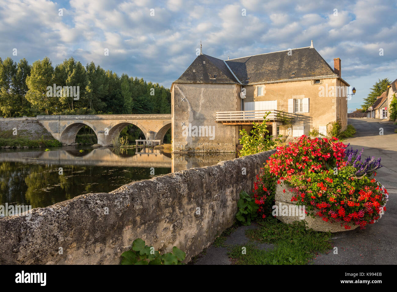 Mill and bridge over river Gartempe, Saint Pierre de Maillé, France. Stock Photo