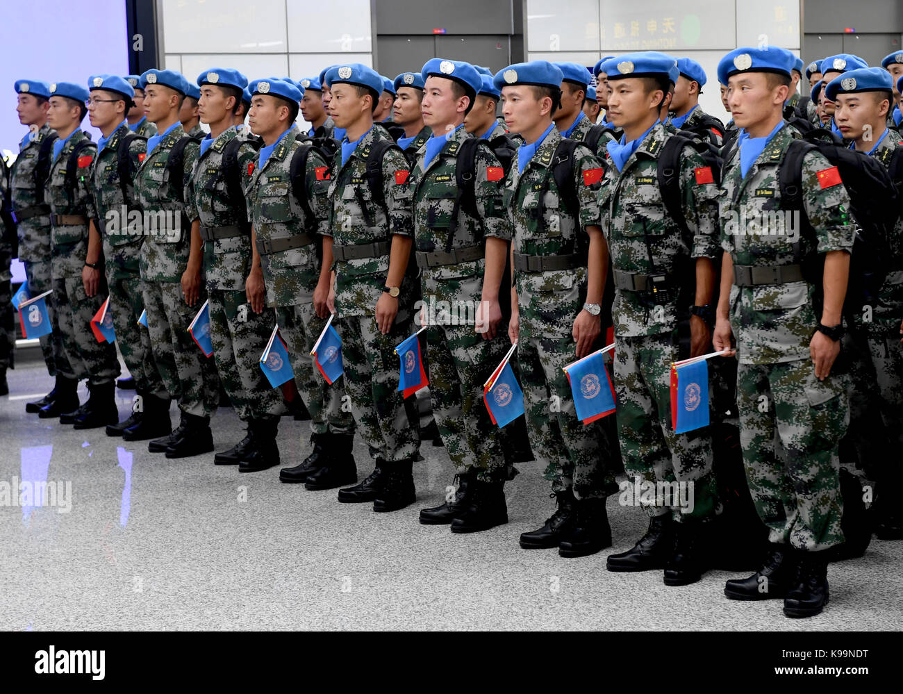 Zhengzhou, China's Henan Province. 21st Sep, 2017. Chinese peacekeepers attend a ceremony before leaving for South Sudan from Zhengzhou, capital of central China's Henan Province, Sept. 21, 2017. The 105-member squad of Chinese peacekeepers left for Wau in South Sudan on a one-year peacekeeping mission. Credit: Zhu Xiang/Xinhua/Alamy Live News Stock Photo