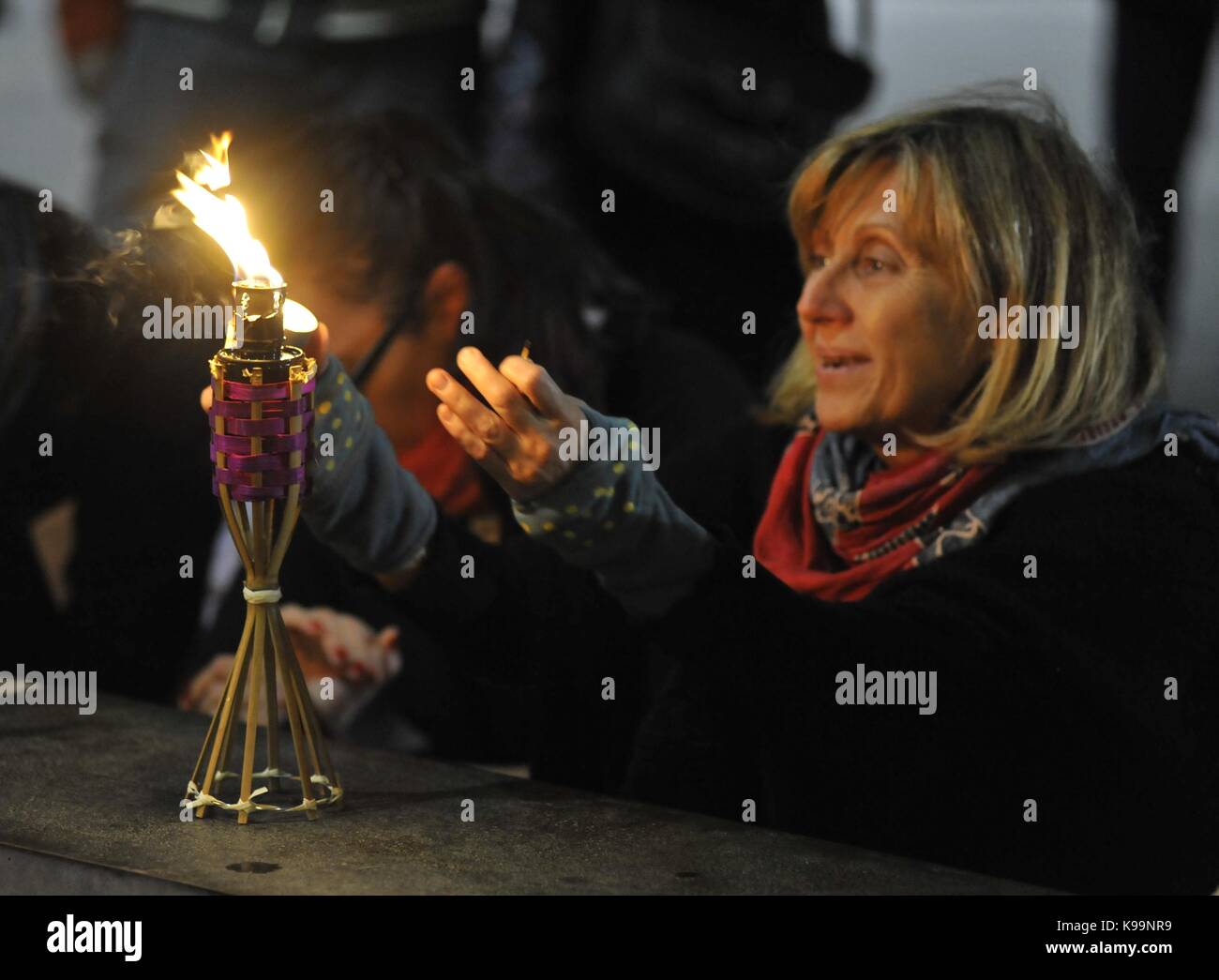 Brno, Czech Republic. 21st Sep, 2017. Happening World Peace Day (International Day of Peace) was held on the Moravian Square in Brno, Czech Republic, on September 21, 2017. Twenty-one of Brno known personalities light up torches for more than two dozen countries which are in the war. Credit: Igor Zehl/CTK Photo/Alamy Live News Stock Photo