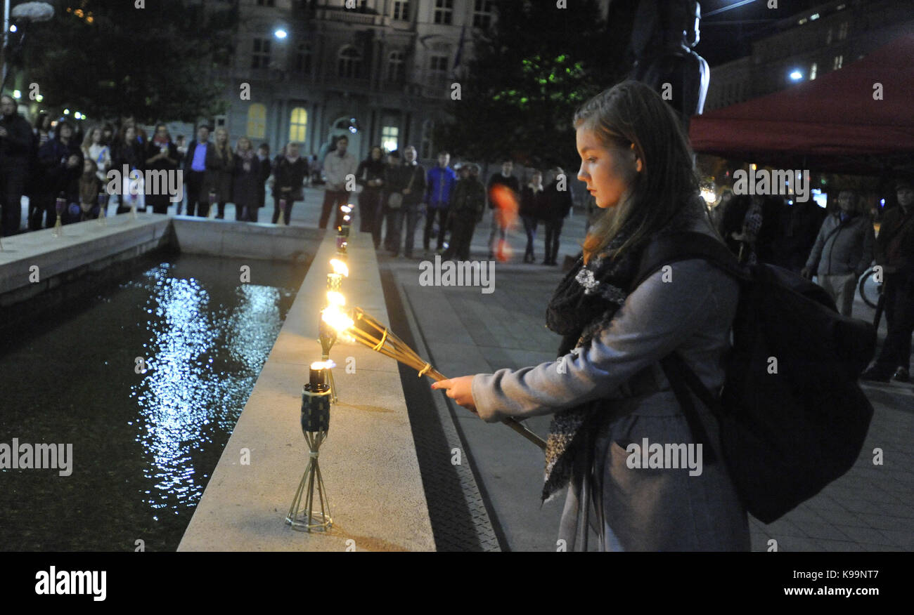 Brno, Czech Republic. 21st Sep, 2017. Happening World Peace Day (International Day of Peace) was held on the Moravian Square in Brno, Czech Republic, on September 21, 2017. Twenty-one of Brno known personalities light up torches for more than two dozen countries which are in the war. On the photo is seen Lucie 'Lala' Myslikova, girl scout. Credit: Igor Zehl/CTK Photo/Alamy Live News Stock Photo