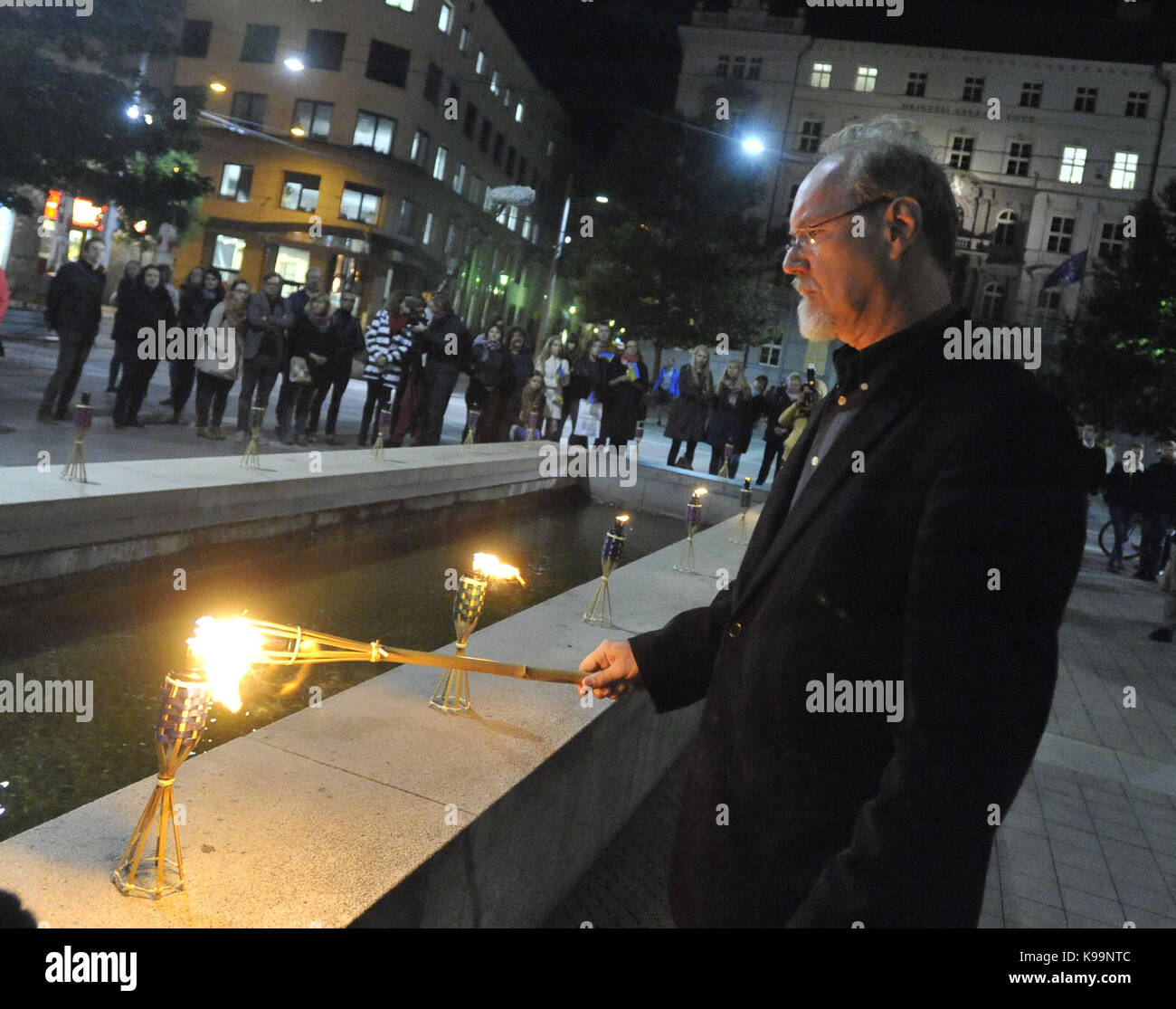 Brno, Czech Republic. 21st Sep, 2017. Happening World Peace Day (International Day of Peace) was held on the Moravian Square in Brno, Czech Republic, on September 21, 2017. Twenty-one of Brno known personalities light up torches for more than two dozen countries which are in the war. On the photo is seen Jaroslav Milfajt, stage designer of the Municipal Theatre Brno. Credit: Igor Zehl/CTK Photo/Alamy Live News Stock Photo
