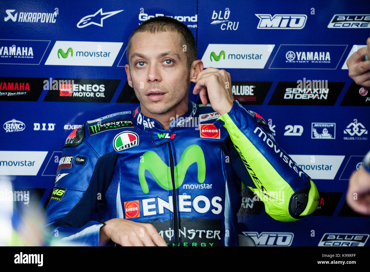 Aragon, Spain. 22 September, 2017. Valentino Rossi; of the Movistar Yamaha Motogp Team rest in the garage during the Aragon Friday free practice of Motogp. Today is the first practice day after suffering leg fractures in a serious motocross crash Credit: Pablo Guillen/Alamy Live News Stock Photo