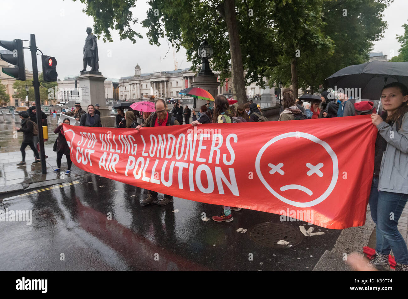 September 21, 2017 - London, UK - London, UK. 21st September 2017. After successfully blocking all traffic in Trafalgar Square for a short protest and a few minutes rest, 'Stop Killing Londoners' block the east side of the square for a few minutes of disco protest, dancing to loud music on the roadway. Eventually police came and told them to leave and the protest ended. This was the 5th protest by campaigners from Rising Up aimed at mobilising people across London to demand action from the Mayor and TfL who are failing to confront this pressing problem. Boris laughed at the problem and Sadiq K Stock Photo