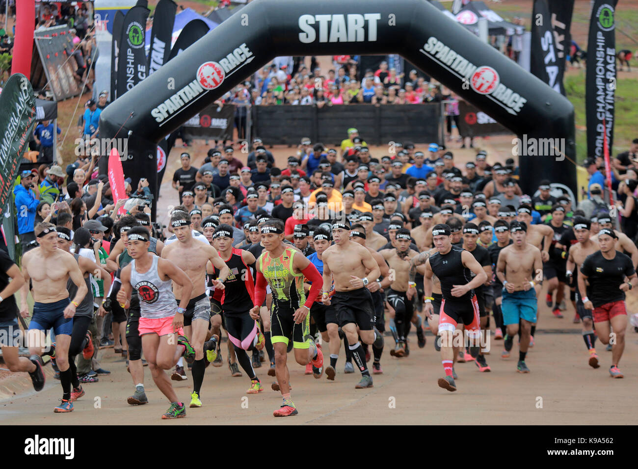 Rizal Province, Philippines. 23rd Sep, 2017. Participants start during the Spartan Race 2017 in Rizal Province, the Philippines, Sept. 23, 2017. Credit: Rouelle Umali/Xinhua/Alamy Live News Stock Photo