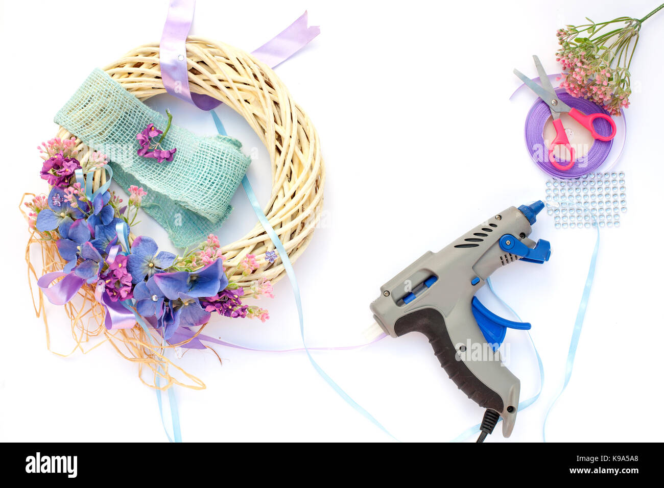 Handmade garland made of flowers and ribbons Stock Photo Alamy