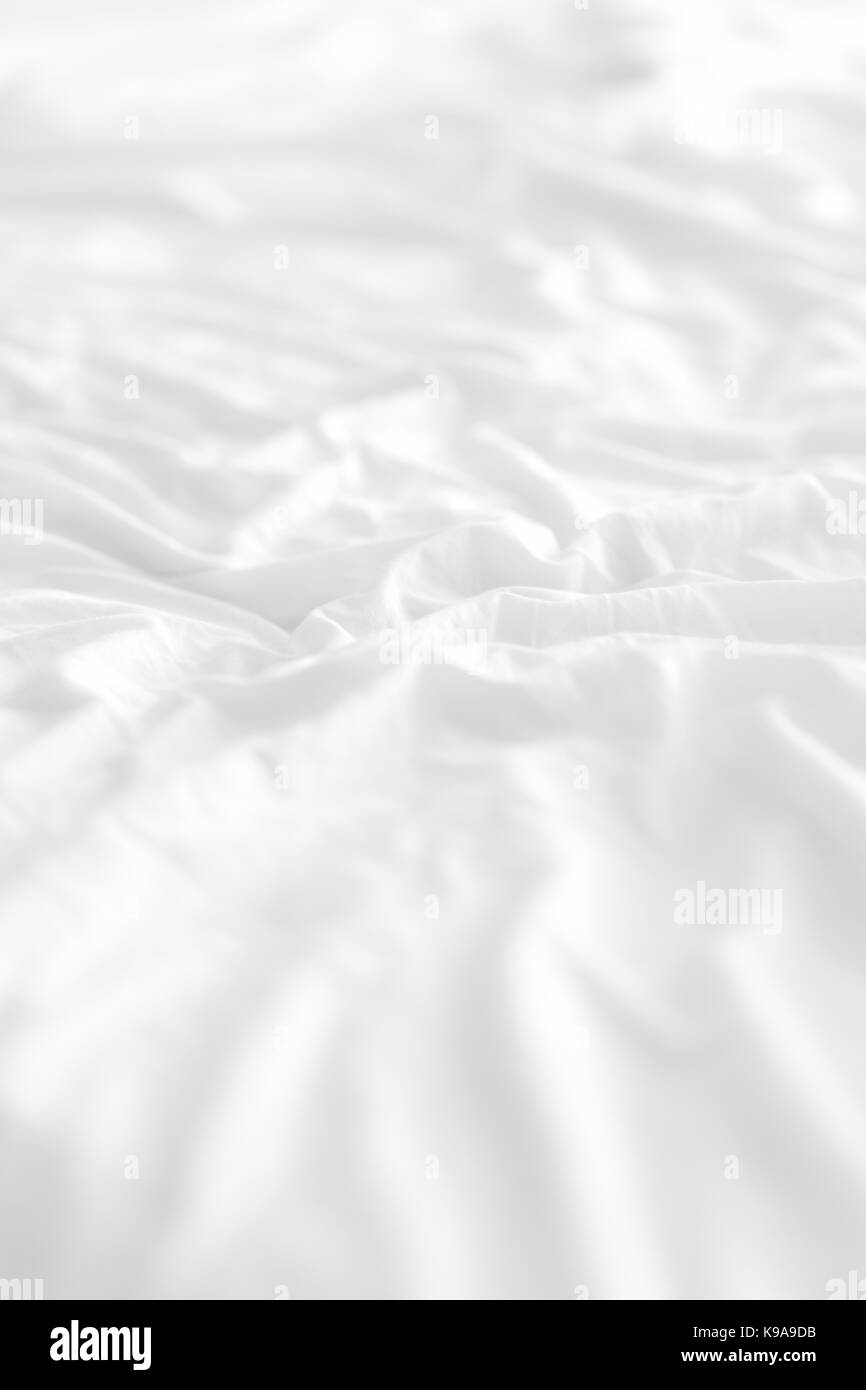 White Bedding sheets crease background Stock Photo Alamy