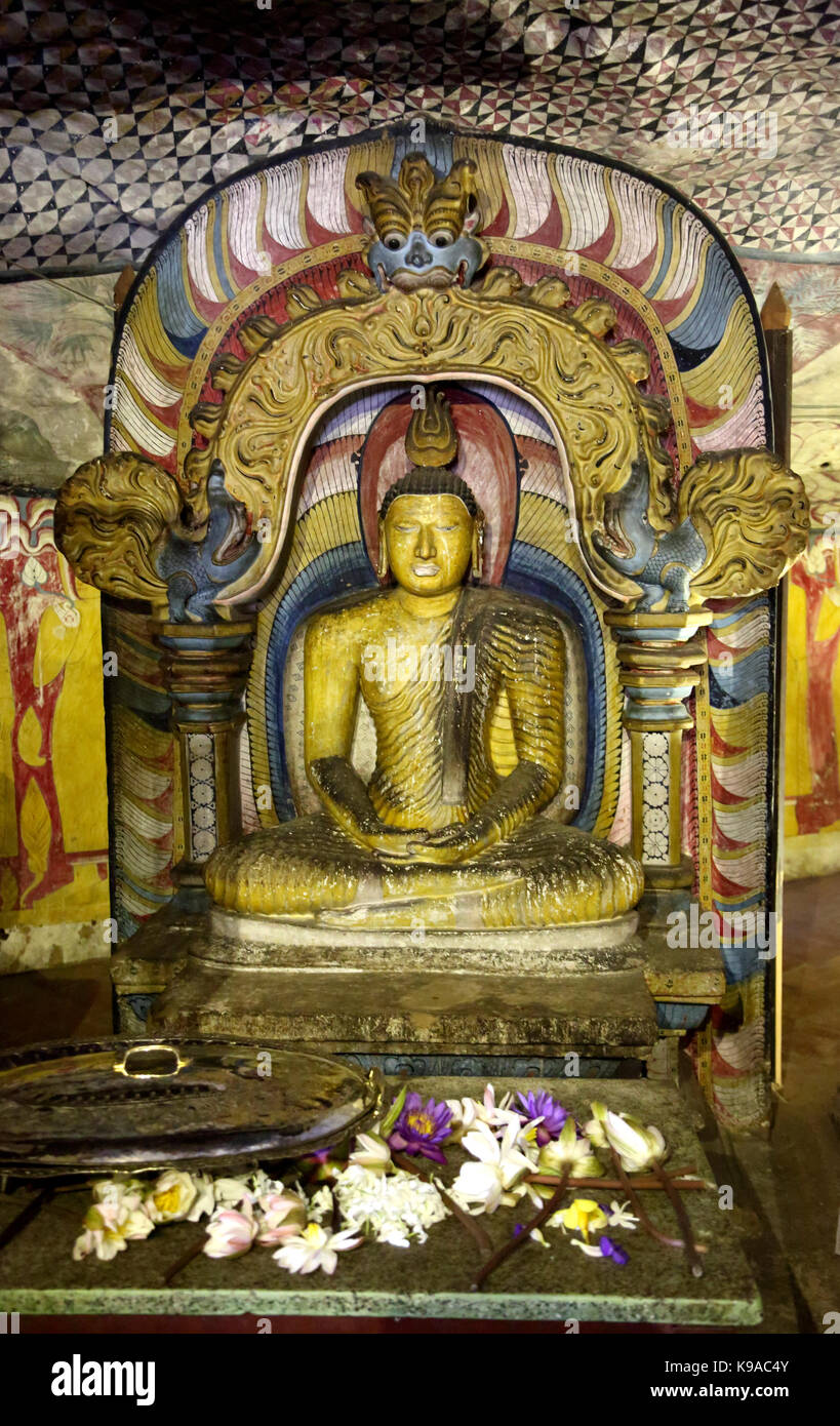 Dambulla Sri Lanka Dambulla Cave Temples - Cave 3  Maha Alut Viharaya Seated Buddha Showing  Dhyana Mudra Gesture Of Meditation Buddha Under Makara Torana Stock Photo