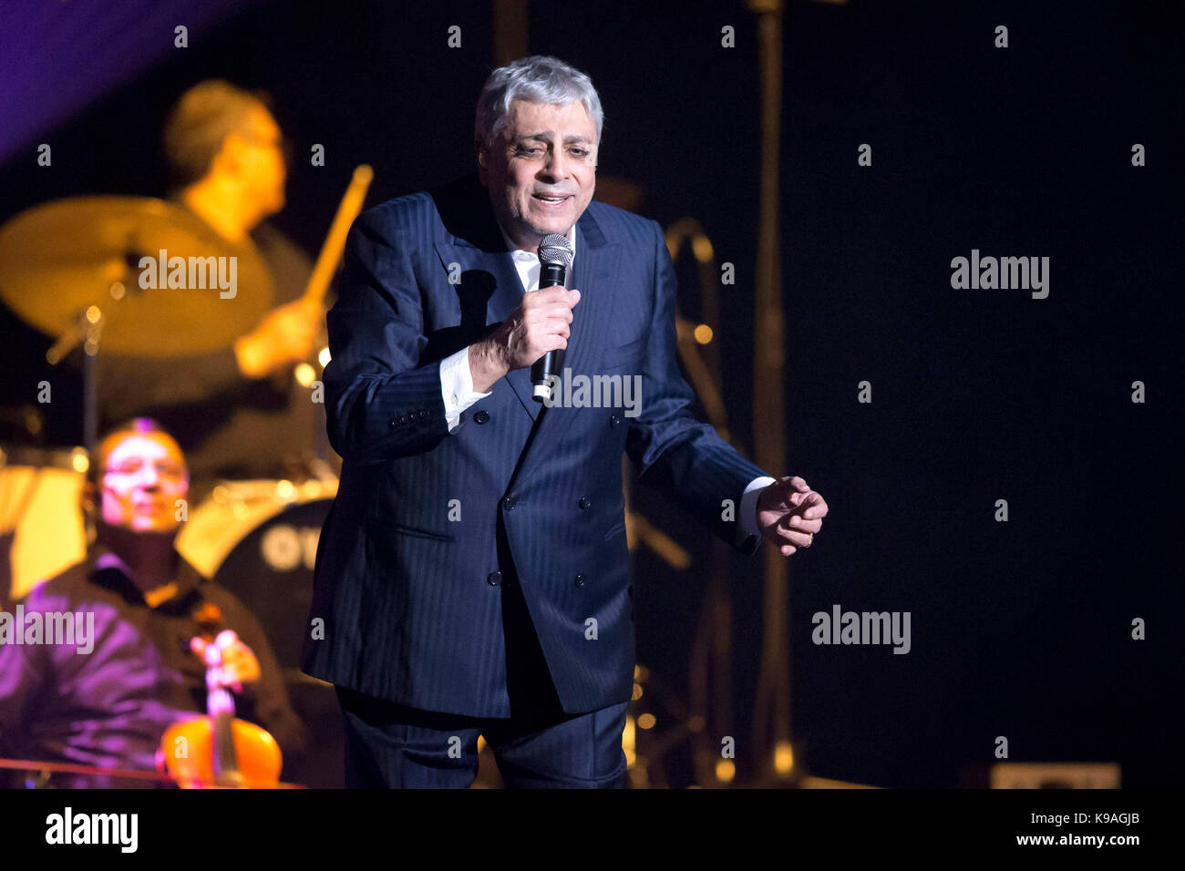 Singer Enrico Macias on stage during a concert at La Palestre concert hall in Le Cannet, on 2015/03/28 Stock Photo