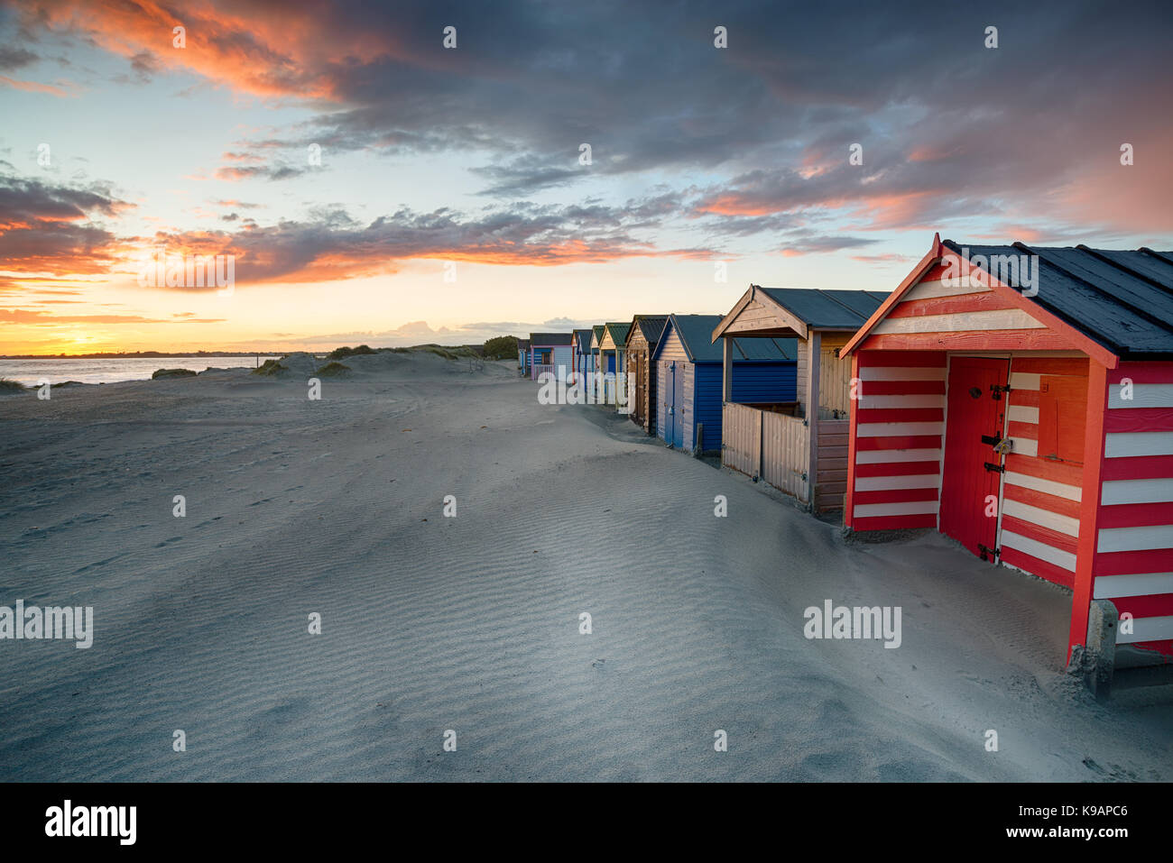 Dramatic Sunset Over Beach Huts At West Wittering On The Sussex 