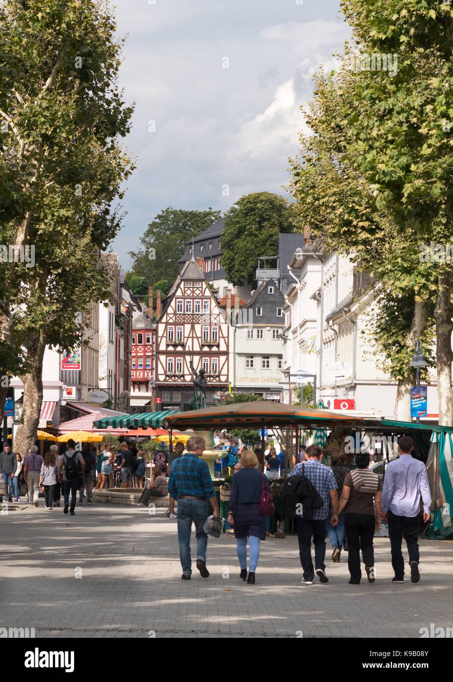 Group of people walking, Limberg town centre, Germany, Europe. Stock Photo