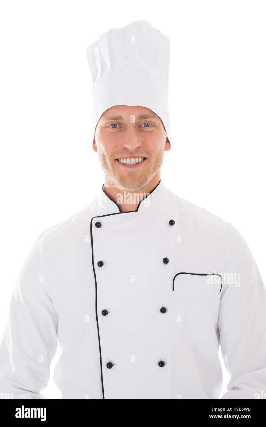 Portrait of happy mid adult male chef isolated over white background Stock Photo