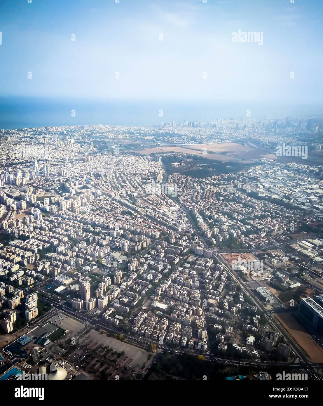 View of Tel Aviv and the Mediterranean Sea from the window of the plane taking off from the airport Ben Gurion Stock Photo