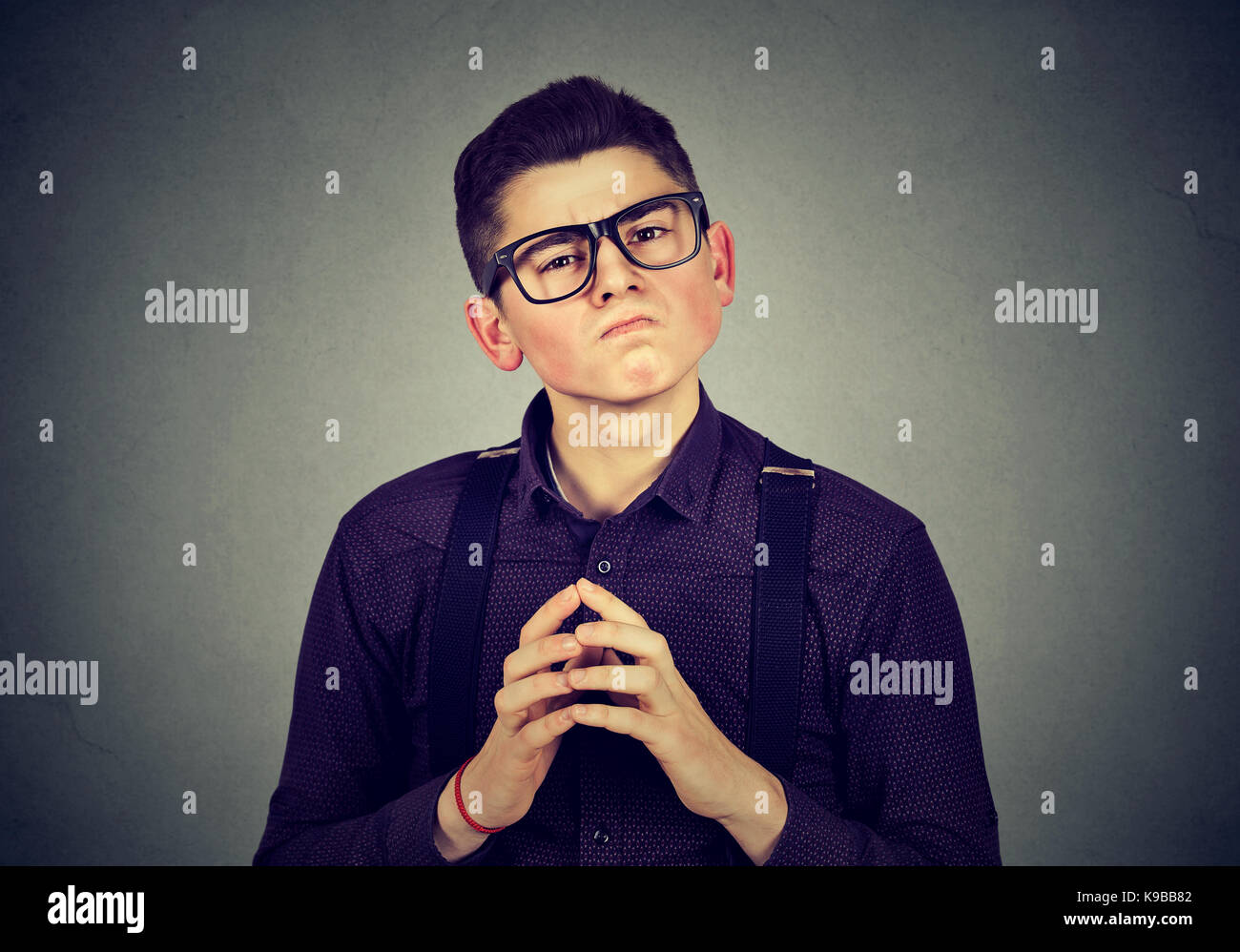 Young man with snobbish face expression Stock Photo