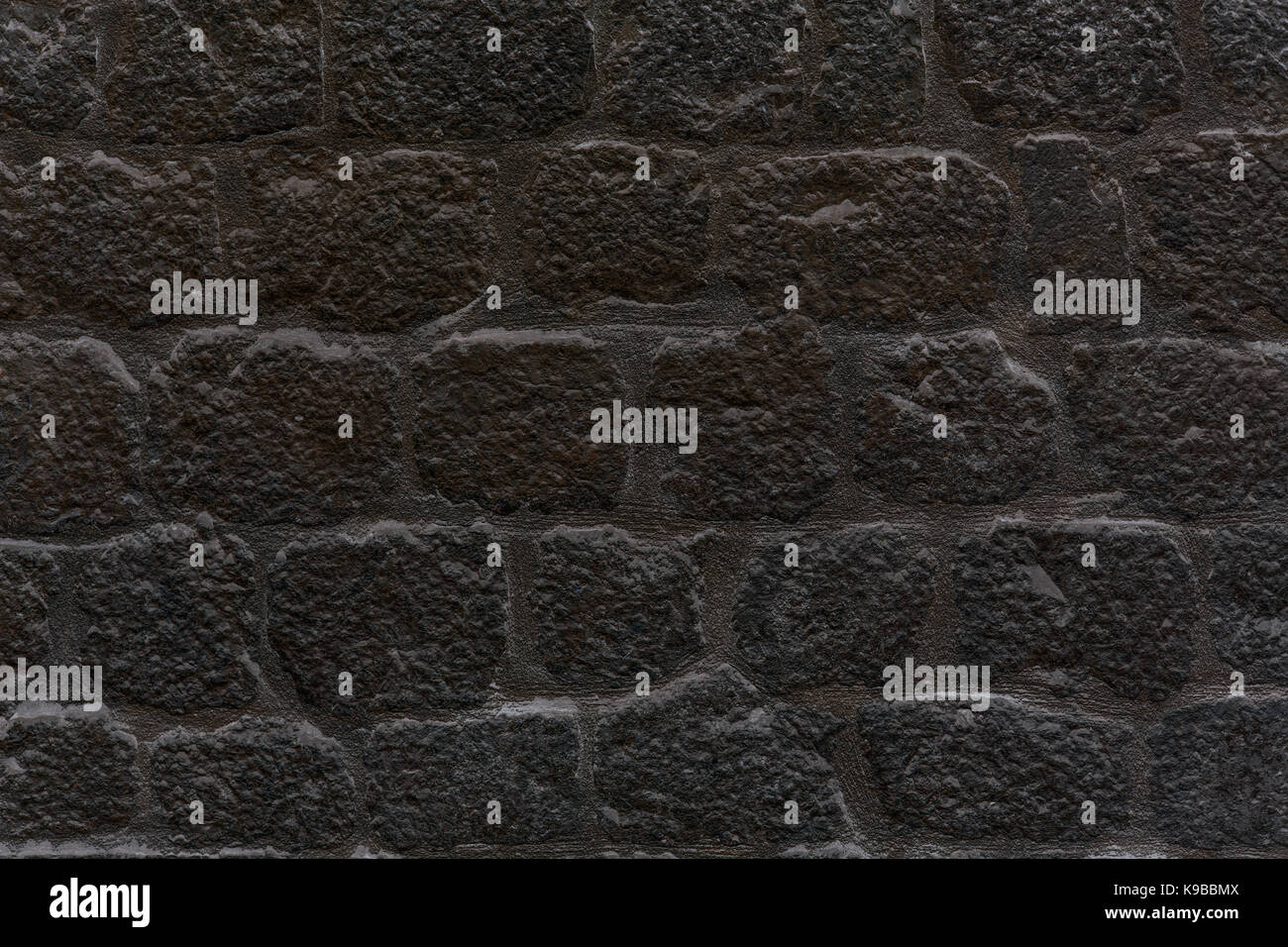black stone wall background or texture Stock Photo