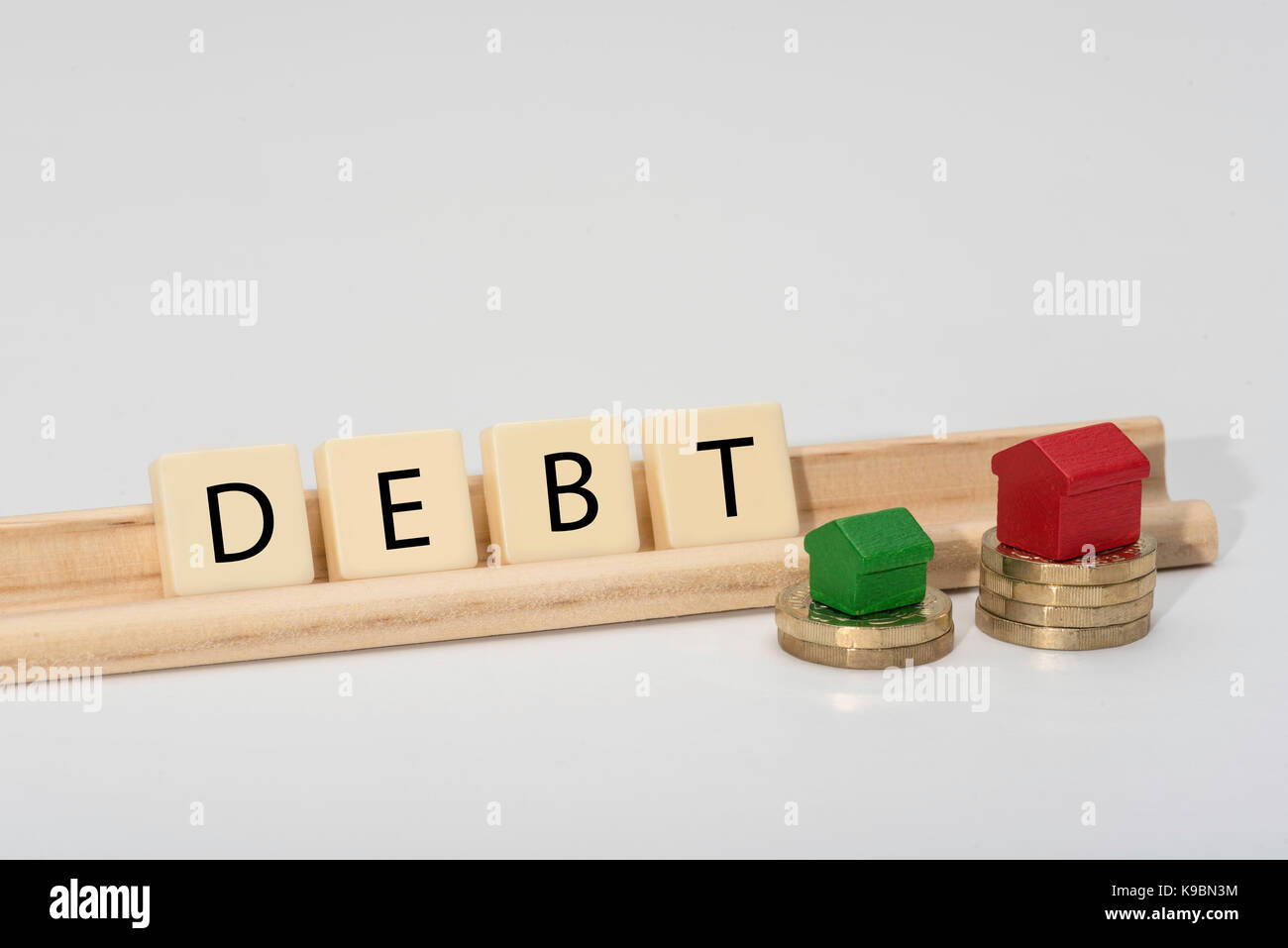 Finance related word spelt out with letter tiles. Isolated on white