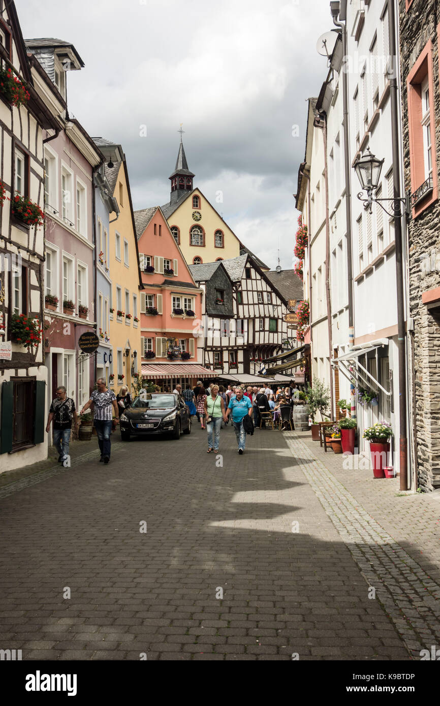 BERNKASTEL-KEUS, GERMANY - 5TH Aug 17:  Tourists stroll along Bewertungen Street, in the middle of the old medieval town of the River Moselle. Stock Photo