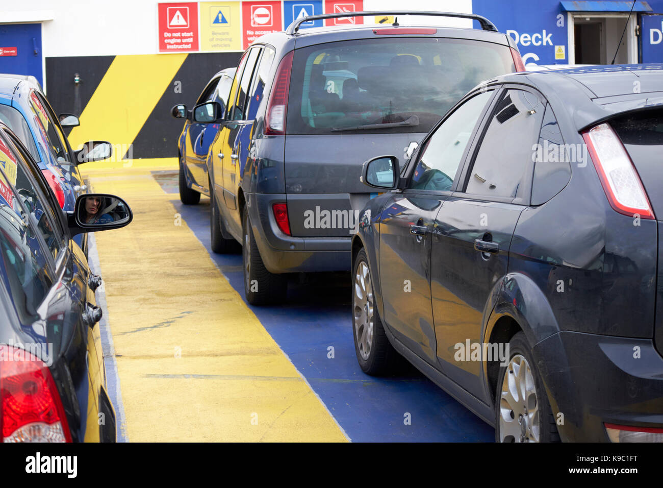 cars parked on upper open vehicle deck on top of stena line vehicle ferry on the irish sea Stock Photo