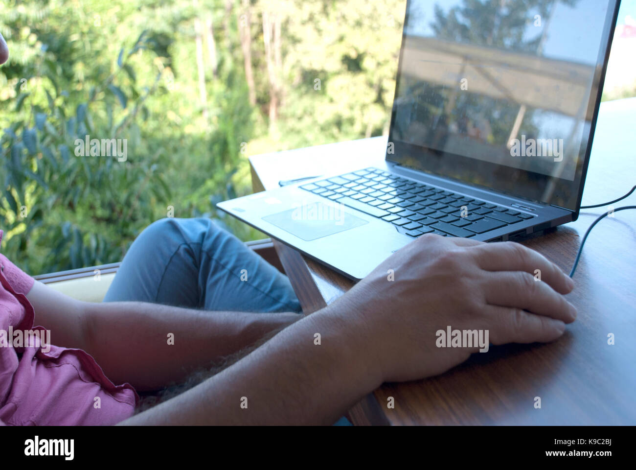 Man using laptop computer Stock Photo - Alamy