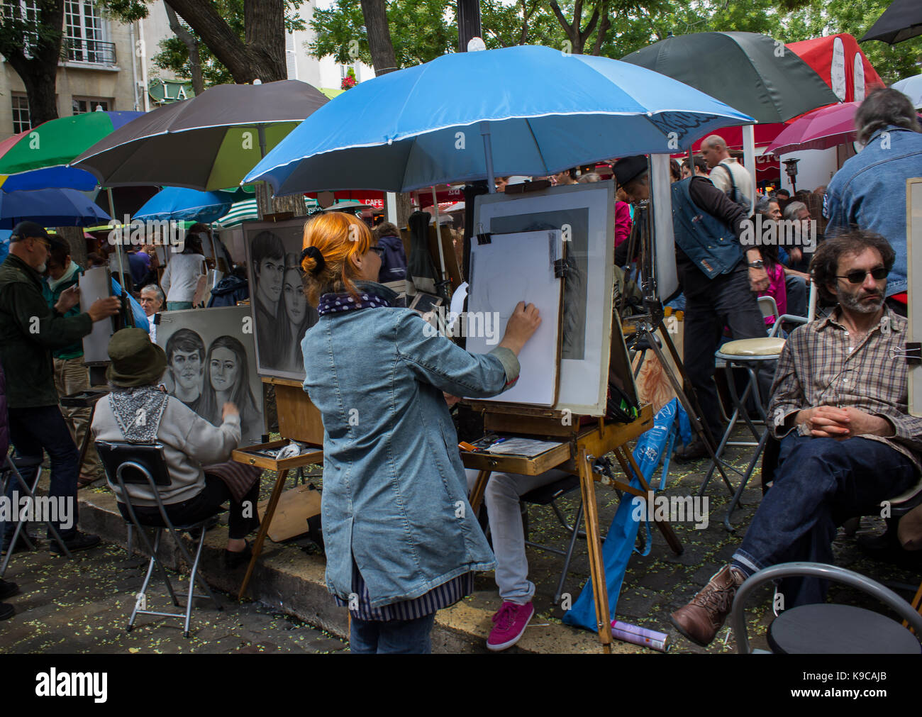 Paris, France - July 24, 2011: Street artists sell their painting in Place du Tertre Stock Photo