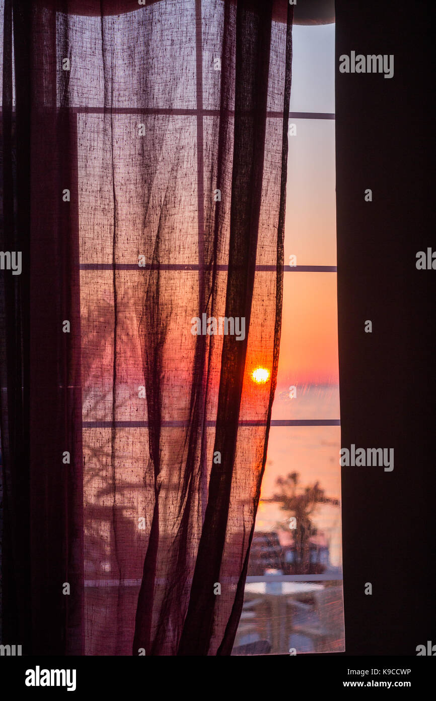 Sunset sea window Stock Photo