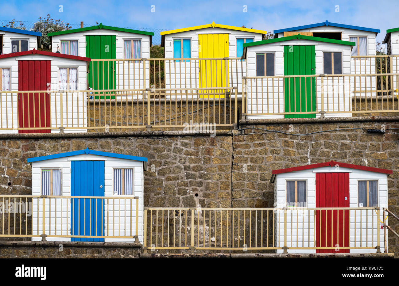 Group of Colourful Beach Huts Overlooking Saturday’s Pit and Summerleaze Beach, Bude, Cornwall. Stock Photo