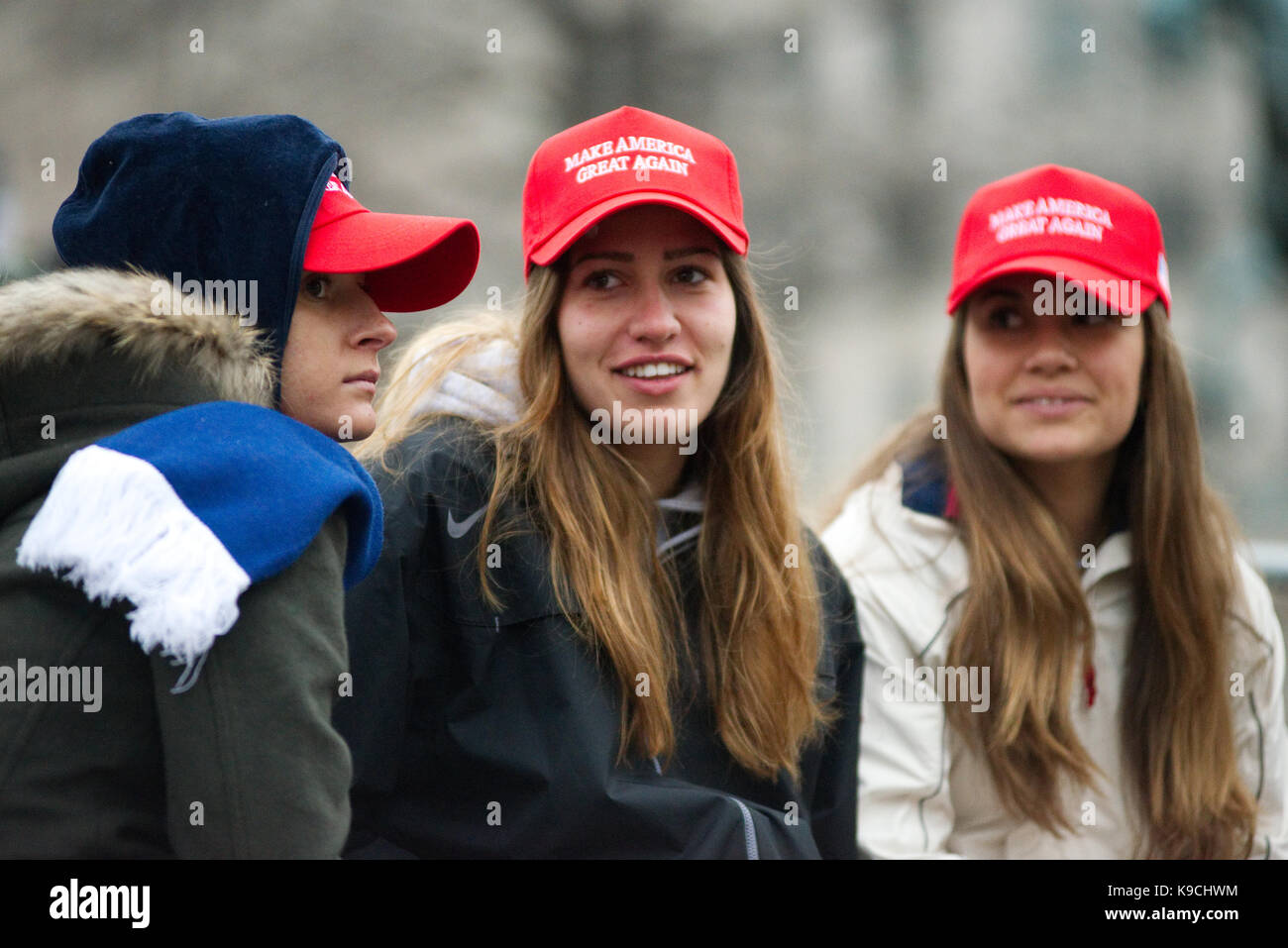 Washington DC, USA - January 20, 2017: Trump supporters gather along the parade route and at the National Mall to see Donald J. Trump sworn in as the  Stock Photo