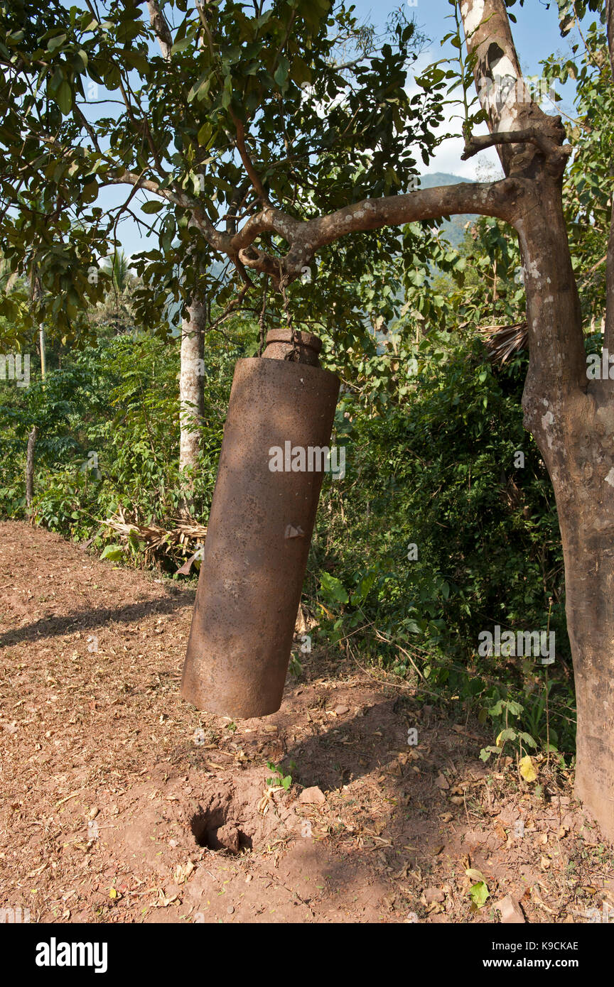 US Bomb casings left over from the Vietnam conflict used as a temple bell in Muang Ngoi Laos Stock Photo