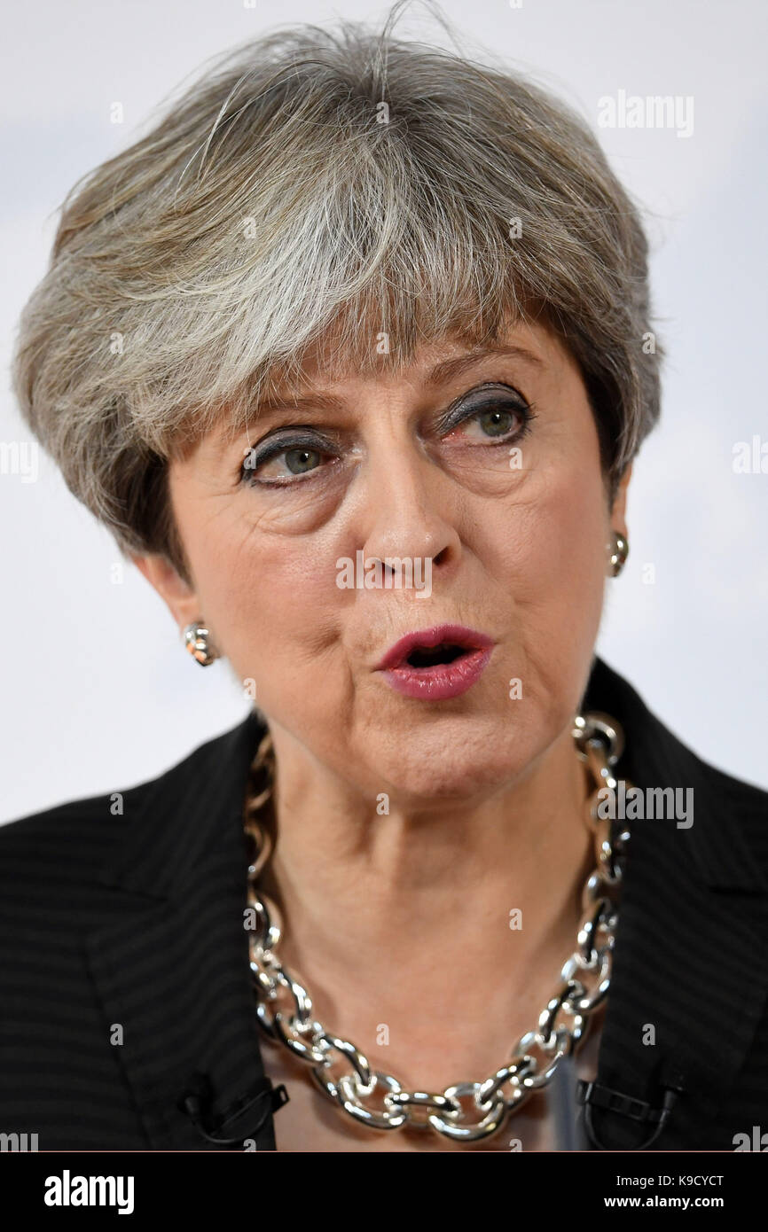 Prime Minister Theresa May delivers a speech in Florence, Italy, where she set out her plans for a transitional period from the formal date of Brexit in March 2019, expected to last two years, before moving to a permanent trade deal. Stock Photo