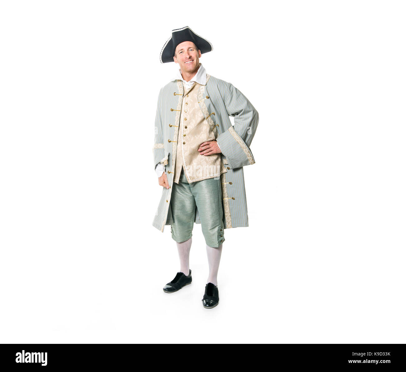 A man dressed as a courtier or prince on white background Stock Photo
