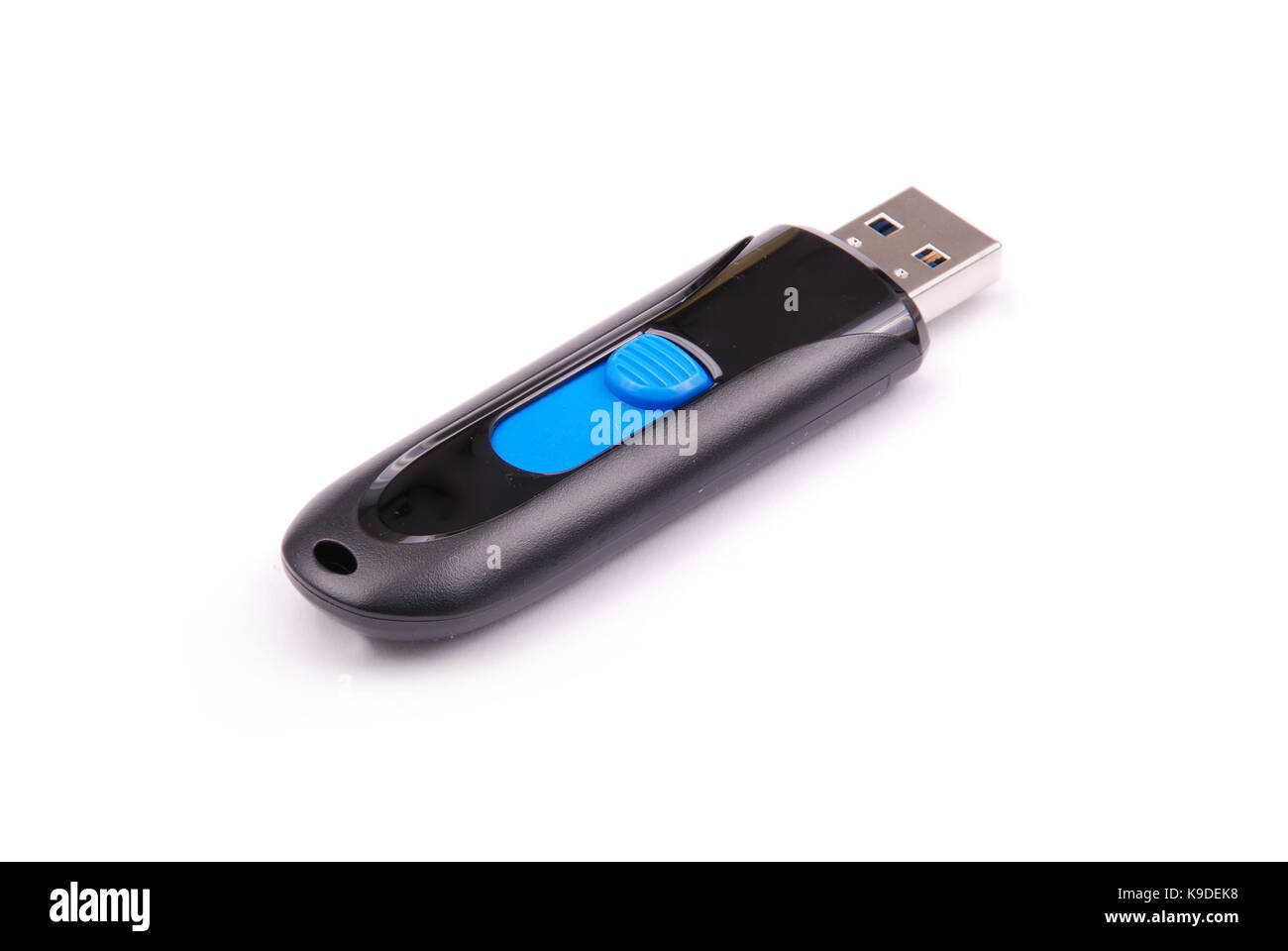 Black and blue USB flash drive isolated on white background with soft