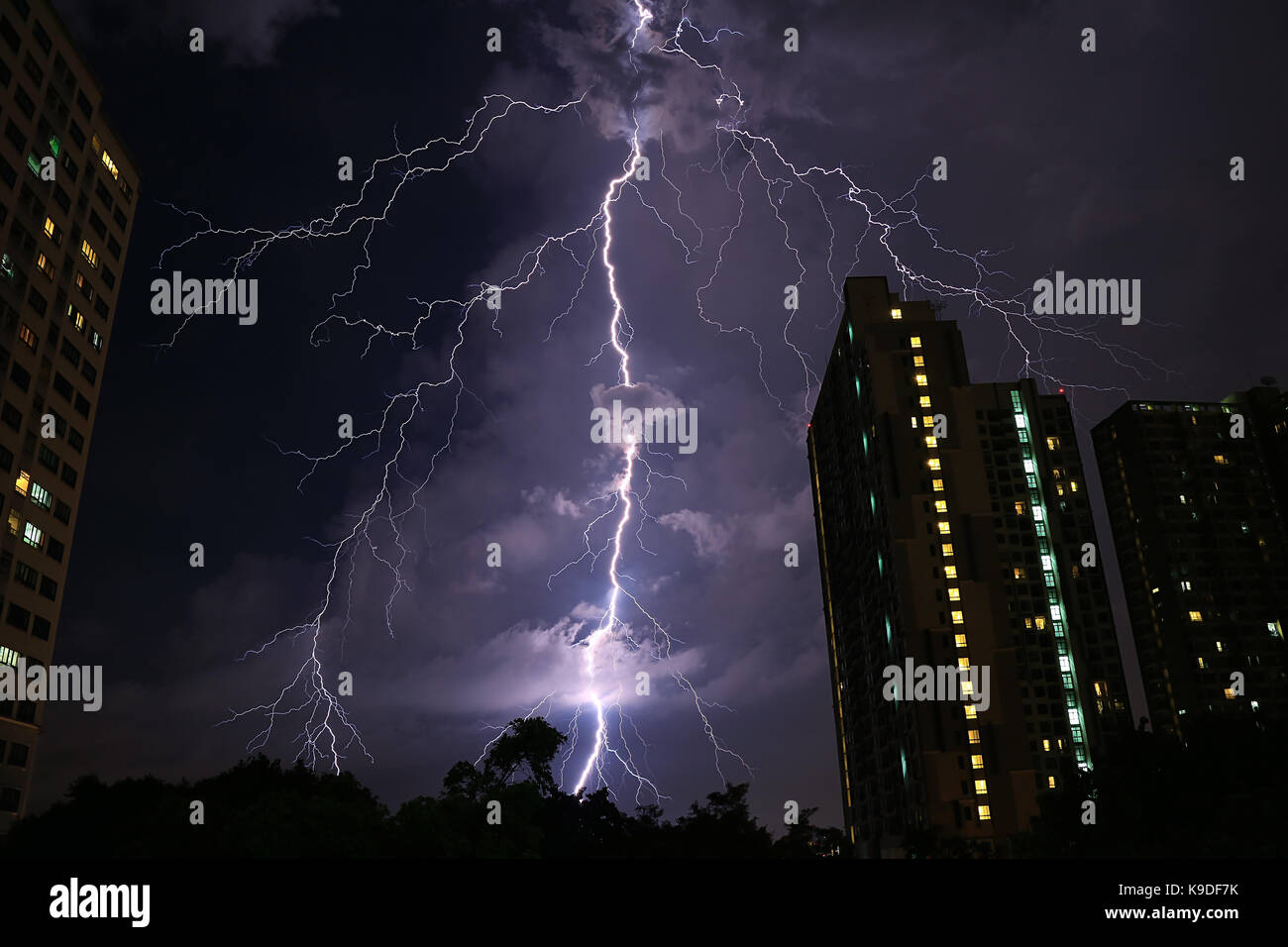 Incredible Real Lightning Striking on Night Sky of Bangkok' s Urban, Monsoon Season in Thailand Stock Photo