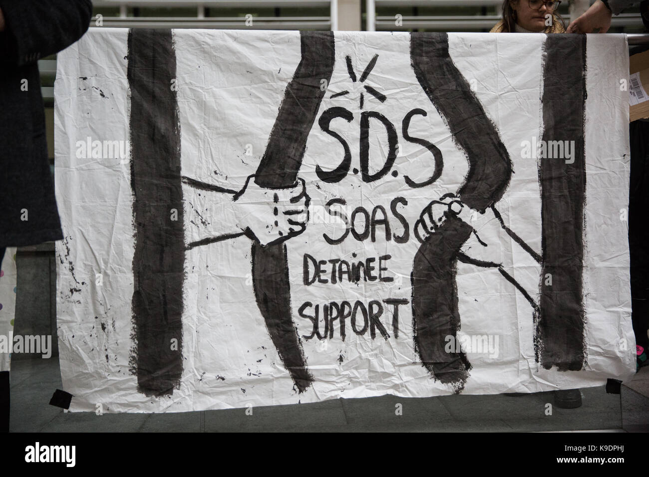 London, UK. 21st September, 2017.  A banner used by campaigners from SOAS Detainee Support (SDS) at an emergency vigil outside the Home Office. Stock Photo